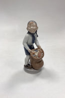 Royal Copenhagen Månedsfigur December - Dreng med Julesæk No. 4534
