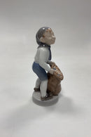 Royal Copenhagen Månedsfigur December - Dreng med Julesæk No. 4534