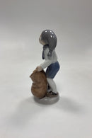 Royal Copenhagen Månedsfigur December - Dreng med Julesæk No. 4534