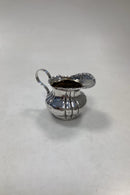Russisk Mælkekande i Sølvplet