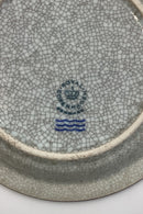 Royal Copenhagen U.E.C mindeplade i krakele
