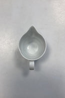 Royal Copenhagen Hvid Magnolia med uglaseret relief Flødekande No. 394