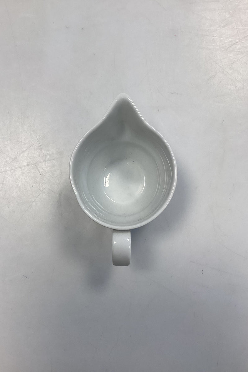 Royal Copenhagen Hvid Magnolia med uglaseret relief Flødekande No. 394