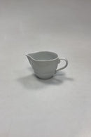 Royal Copenhagen Hvid Magnolia med uglaseret relief Flødekande No. 394