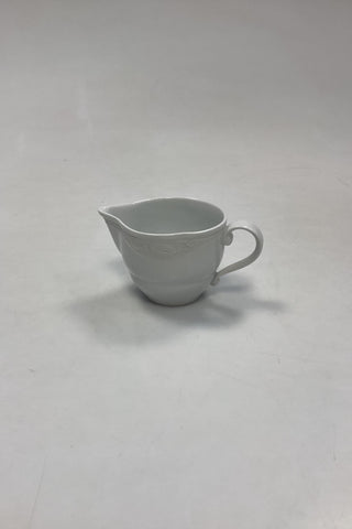 Royal Copenhagen Hvid Magnolia med uglaseret relief Flødekande No. 394