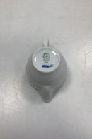 Royal Copenhagen Hvid Magnolia med uglaseret relief Flødekande No. 394