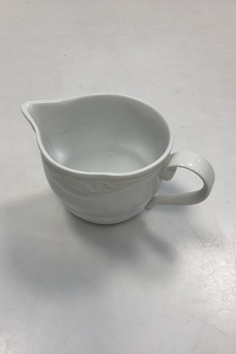 Royal Copenhagen Hvid Magnolia med uglaseret relief Flødekande No. 394