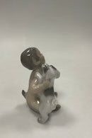 Royal Copenhagen Figur af Faun med hund No 2823
