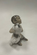 Royal Copenhagen Figur af Faun med hund No 2823