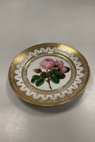 Royal Copenhagen Antique Plate with Floral Motif and gold. Signed by Christian Klein from 1820-1850