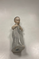 Royal Copenhagen Art Nouveau Figur af Nøgen Baby i klæde No. 3505