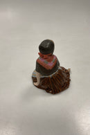 Royal Copenhagen Overglasur Figur af Farø Blomster Pige No. 12416