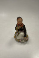 Royal Copenhagen Overglasur figur af Amager Blomster Pige No. 12412