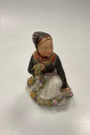 Royal Copenhagen Overglasur figur af Amager Blomster Pige No. 12412