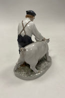 Royal Copenhagen Figurine Pig boy with pig No. 848