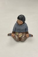 Royal Copenhagen Figur i Overglasur - Dreng med blomster fra Grønland No. 12419