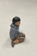 Royal Copenhagen Figur i Overglasur - Dreng med blomster fra Grønland No. 12419