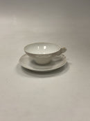 Royal Copenhagen / Kgl. Porcelæn Skærsommernatsdrøm Thekop Lyserød No. 1320 / 61  Designet af Arnold Krog.  Måler 4,1cm x  9,6cm og underkop 14,2 cm ( 1.61 inch x 3.77 inch, 5.55 inch ) Skår i underkoppen