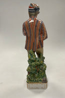 Royal Copenhagen Overglasur Figur af ung mand fra Horne No. 12225
