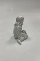 Royal Copenhagen Blanc de Chine Figurine - Boy with flowers from Greenland No. 12419