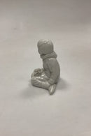 Royal Copenhagen Blanc de Chine Figurine - Boy with flowers from Greenland No. 12419