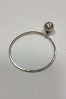 Silver bangle with ball pendant and engraving