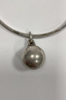 Silver bangle with ball pendant and engraving