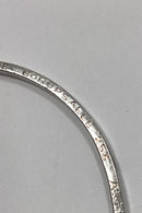 Silver bangle with ball pendant and engraving