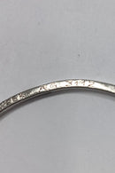 Silver bangle with ball pendant and engraving