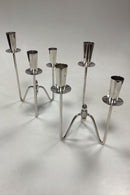 Par trearmede Lysestager i Sølvplet af Johannes Berg