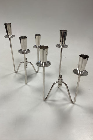 Par trearmede Lysestager i Sølvplet af Johannes Berg