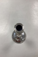 Par Høje Lysestager i Sølvplet af I. P. C. Hansen