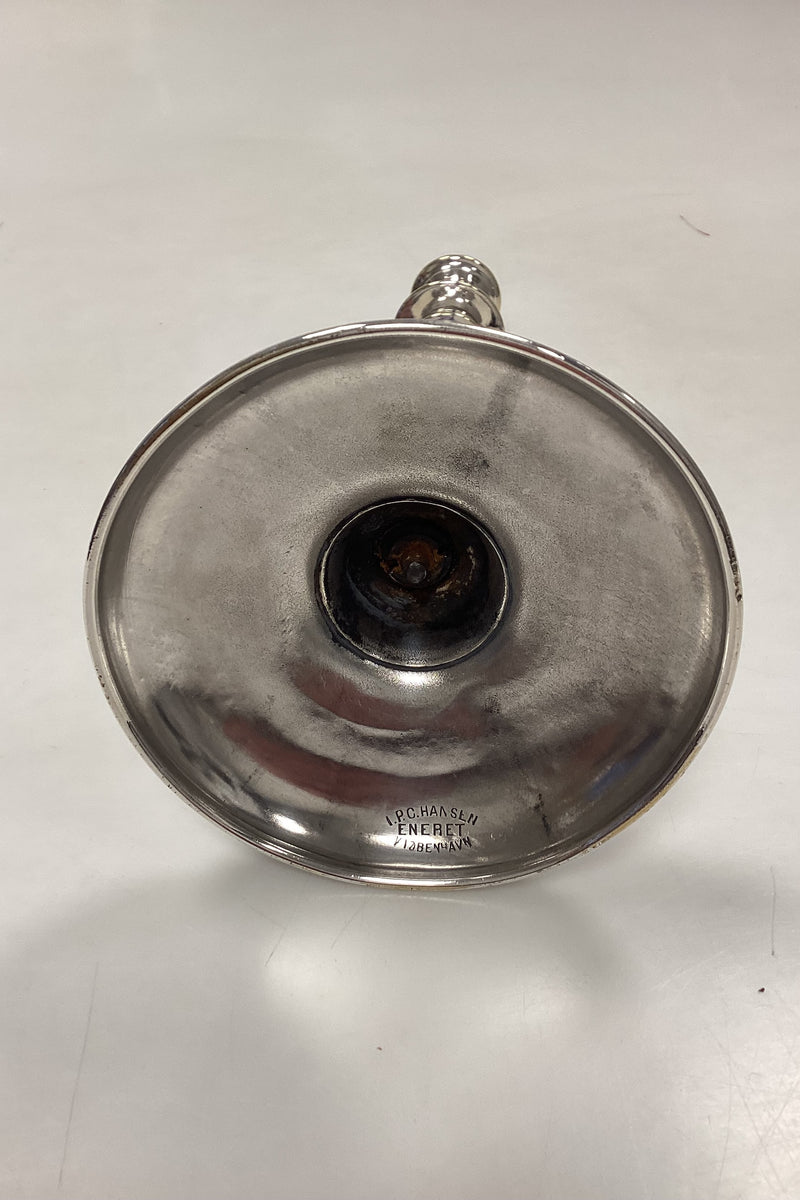 Par Høje Lysestager i Sølvplet af I. P. C. Hansen