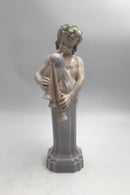 Royal Copenhagen Figurine Dionysus / Bacchus with bagpipe No. 2071