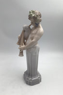 Royal Copenhagen Figurine Dionysus / Bacchus with bagpipe No. 2071