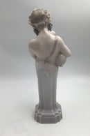 Royal Copenhagen Figurine Dionysus / Bacchus with bagpipe No. 2071