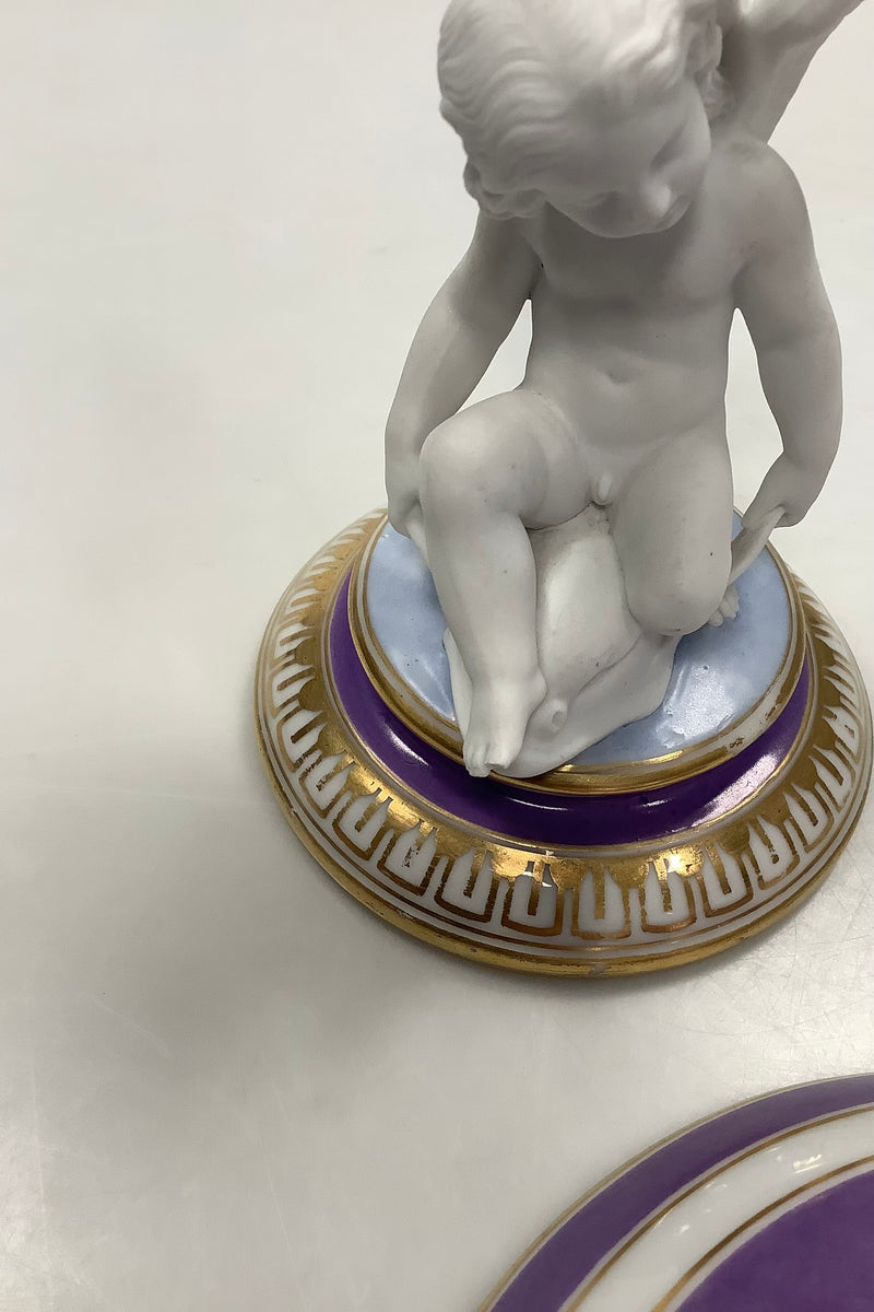 Royal Copenhagen Putti Seated with Bowl from 1860-1880