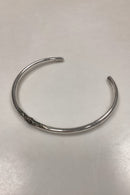 Modern Open Neck Ring in unmarked silver