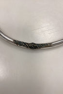 Modern Open Neck Ring in unmarked silver