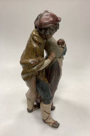 Lladro Stentøjsfigur af Pige og Dreng med Hund - Facing the Wind