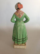 Royal Copenhagen Kvinde Figur i egndragt fra ALS designet af Carl Martin-Hansen No 12220