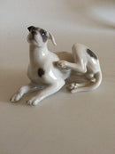 Royal Copenhagen Figur eines liegenden Hundes Nr. 1452/2855