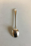 Silberlöffel mit Ornamenten und vergoldetem Löffel