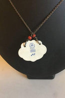 ロイヤルコペンハーゲン Arje Griegstデザインの磁器製ペンダント。アントン・ミケルセンによるスターリングシルバー