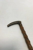 Antique Irish walking stick w.  head of carved antlers horn and shaft of black thorn. Collar of white metal, No ferule.