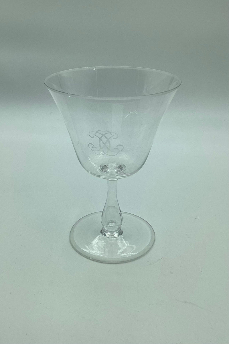 Wine glass with monogram on bell-shaped bowl and hollow stem c. 1930-1