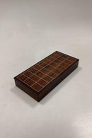 Rosewood box with inlaid metal pattern