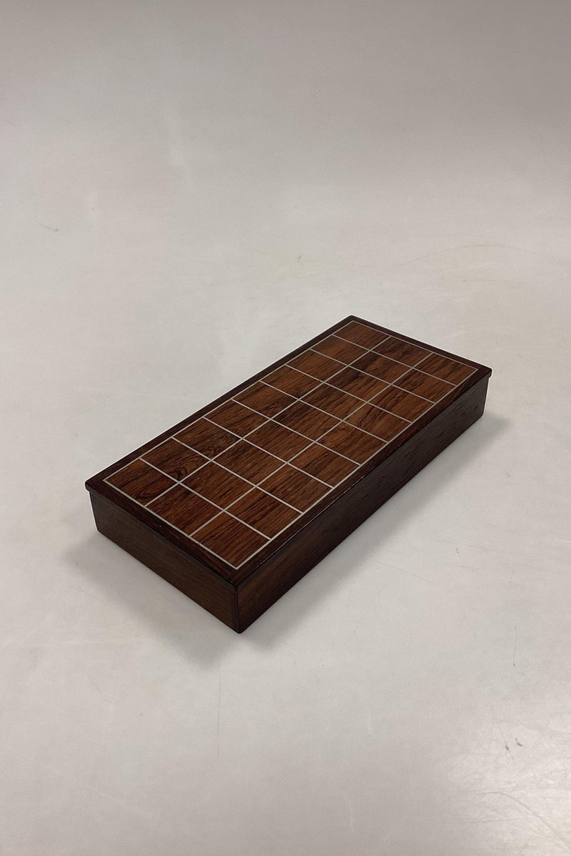 Rosewood box with inlaid metal pattern