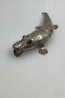 Alligator / Crocodile in silver with movable joints. Red flus eyes