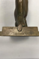 Tinos Bronzefigur/Bogstøtte af knælende kvinde